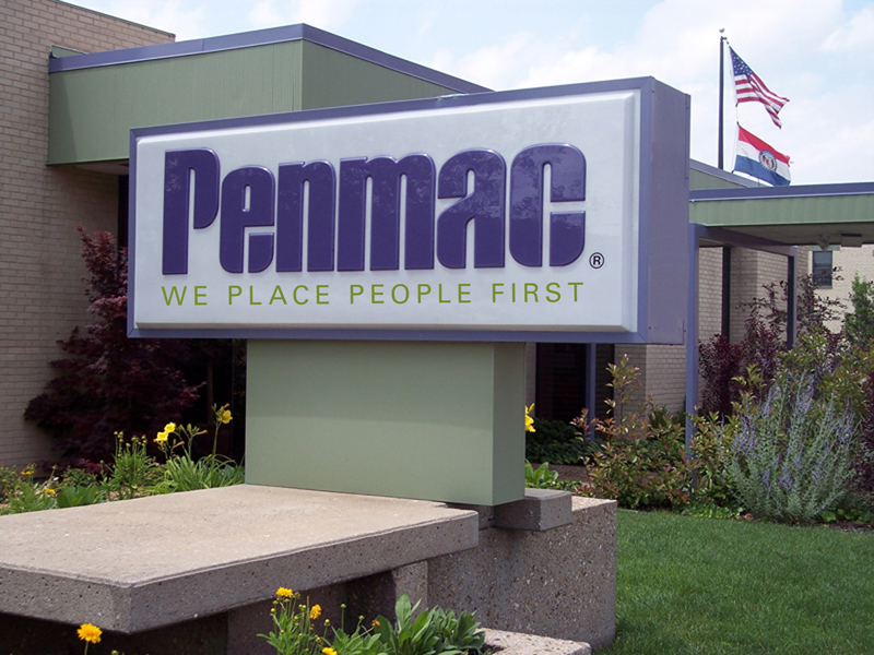 Penmac Staffing Sign with American and Missouri flags flying in background